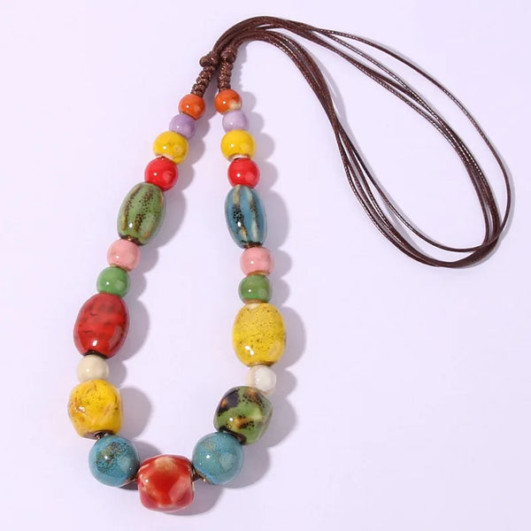 Ceramic planets necklace
