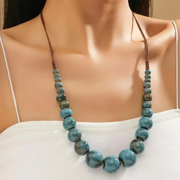 Ceramic planets necklace