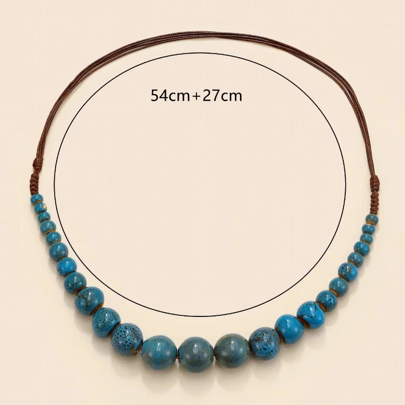 Ceramic planets necklace